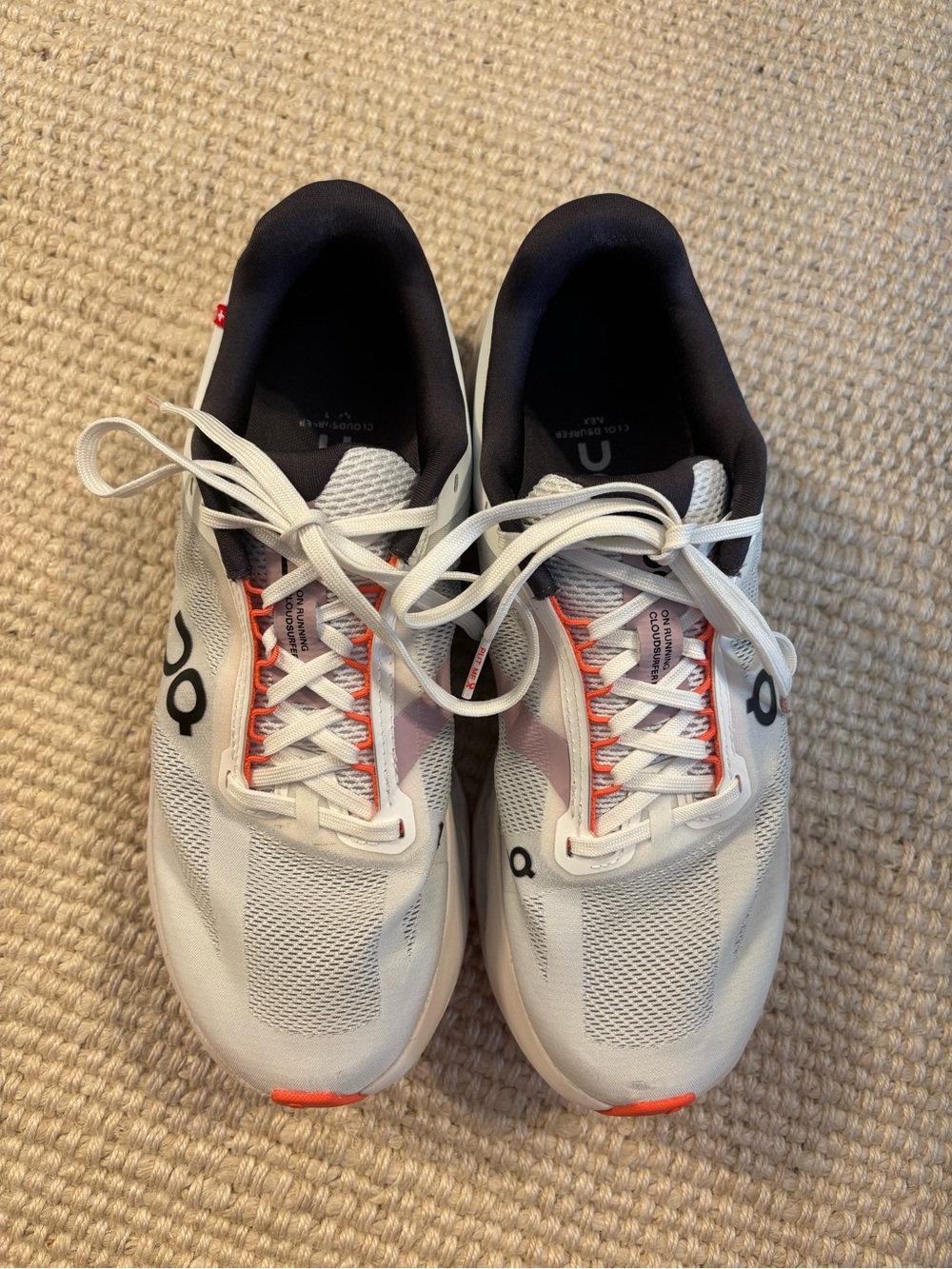 On Running womens Cloudsurfer Next shoes in White with Orange Accents - Picture 2 of 5